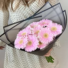 9 Розовых Гербер в упаковке