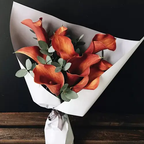 Букет "9 Оранжевых Калл"